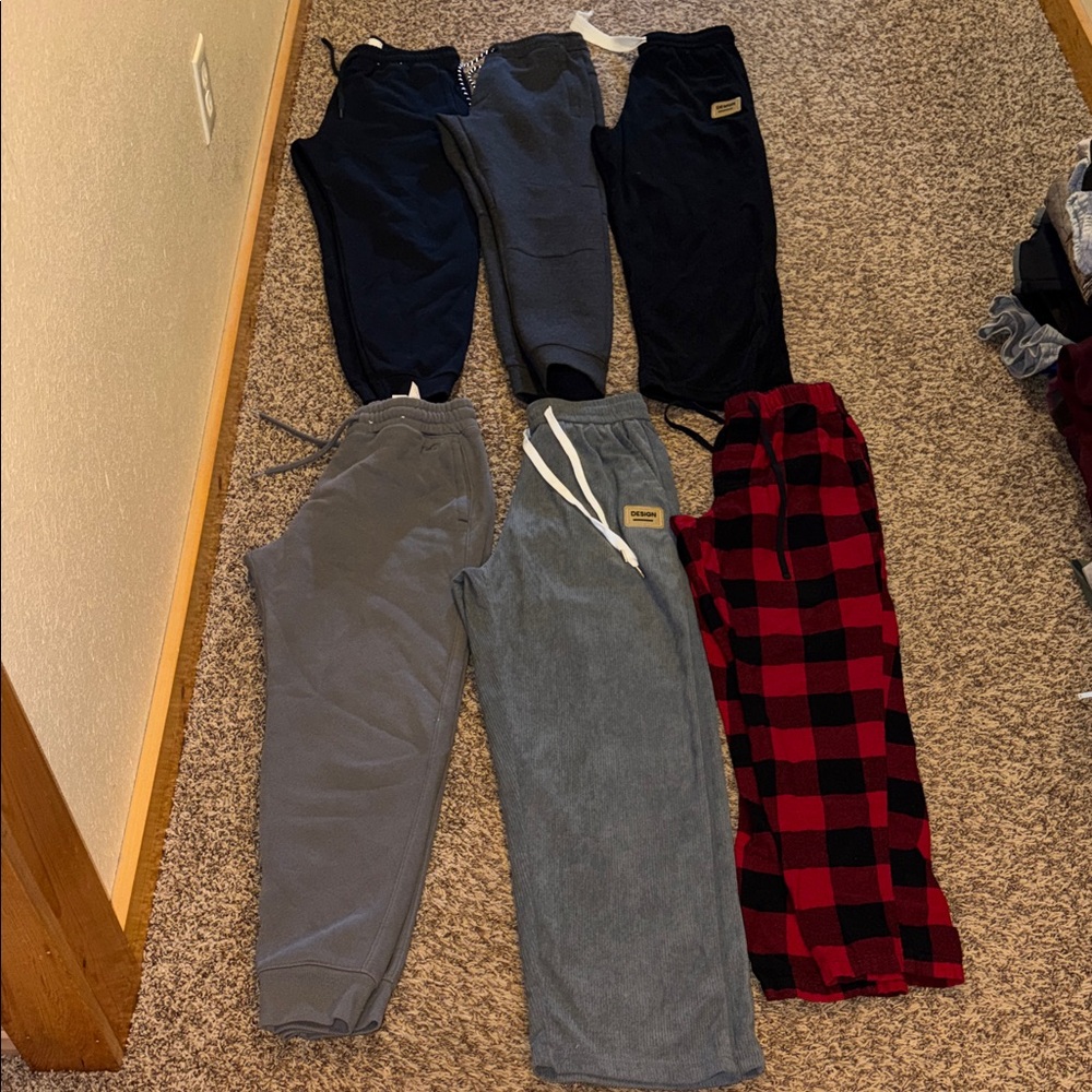 Assorted lot size small sweats.